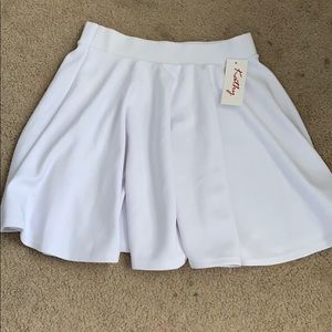 A white large flowy skirt with tag never worn